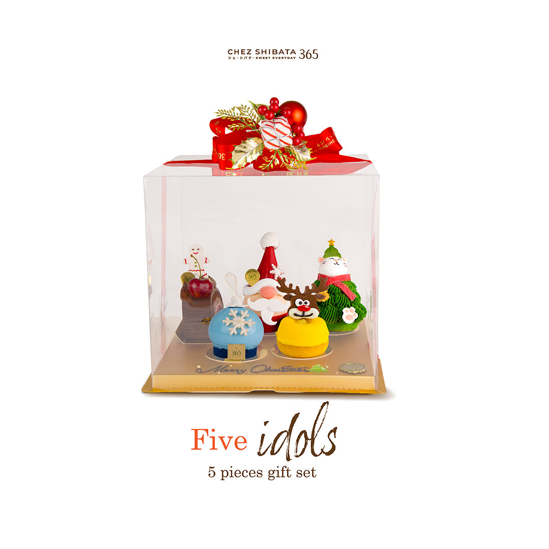 Five Christmas-themed figurines in a clear box from Chez shibata365