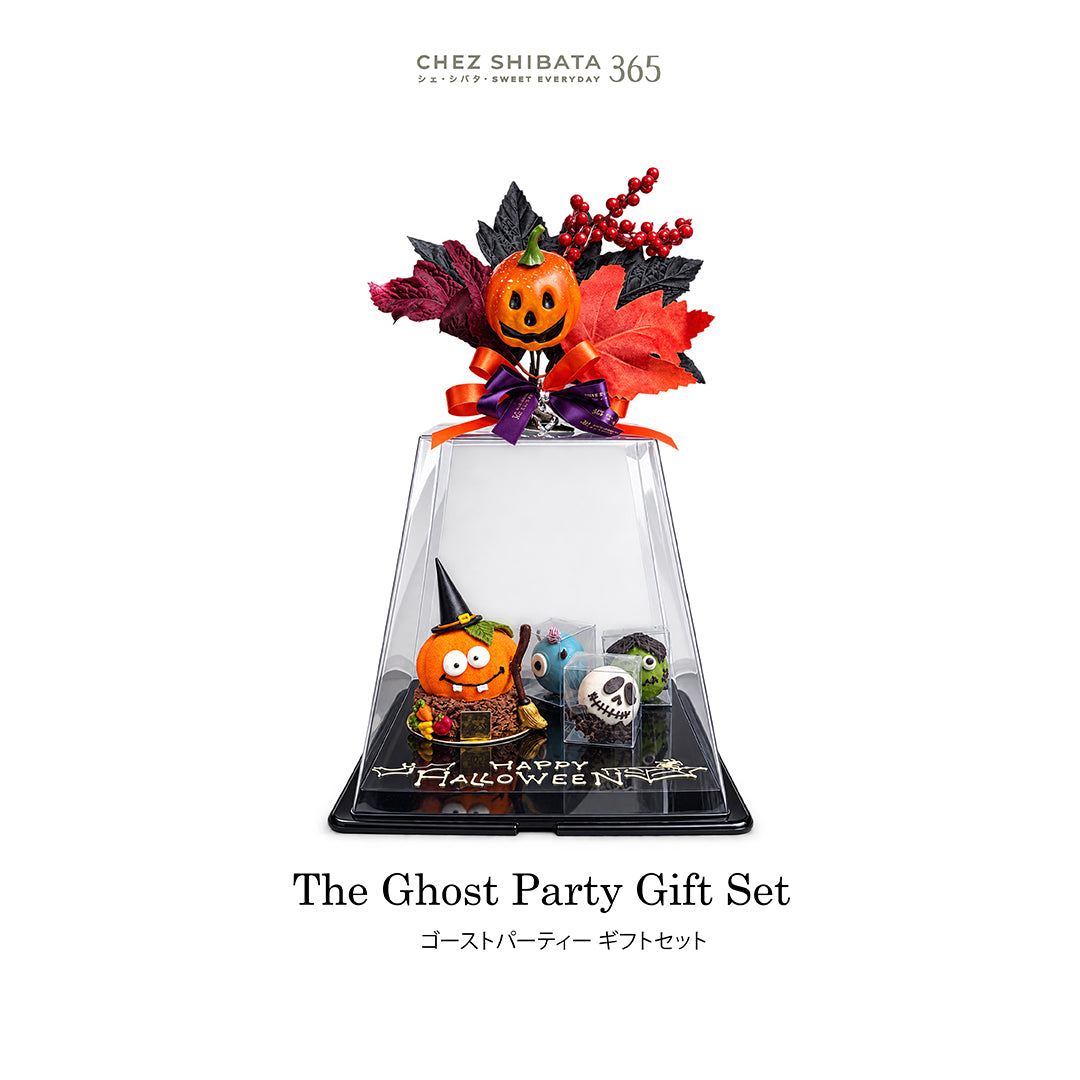 Chez Shibata 365 The Ghost Party Gift Set, featuring a Halloween-themed miniature display under a clear dome. The set includes a jack-o'-lantern, a ghost, a skull, and a witch hat, topped with autumn leaves, berries, and a pumpkin on a black base.
