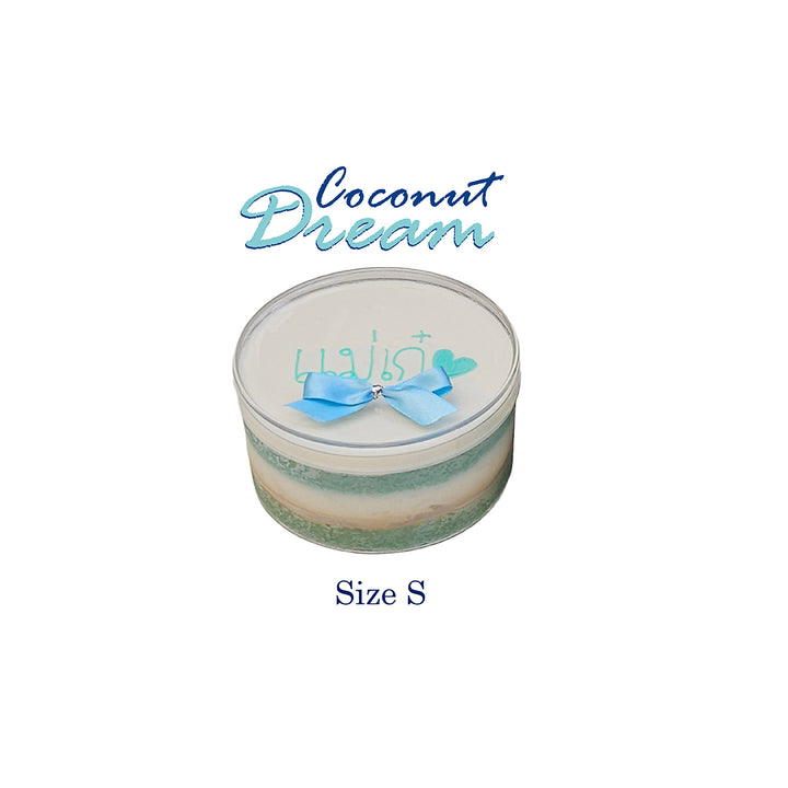 Small container labeled 'Coconut Dream' with a blue bow on a white background