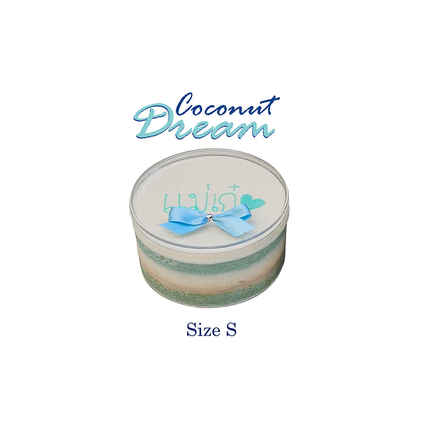 Small container labeled 'Coconut Dream' with a blue bow on a white background
