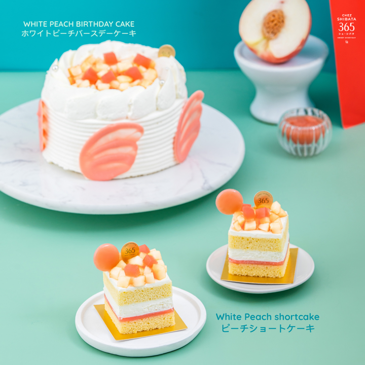 Title: White Peach Birthday Cake Meta Description: White Peach cake is a delicious and unique cake that is especially popular in Japan. The cake is formed by mixing white peach with cake batter and then baked. Chez shibata365 เค้กผลไม้ เค้กพีช เค้กญี่ปุ่น